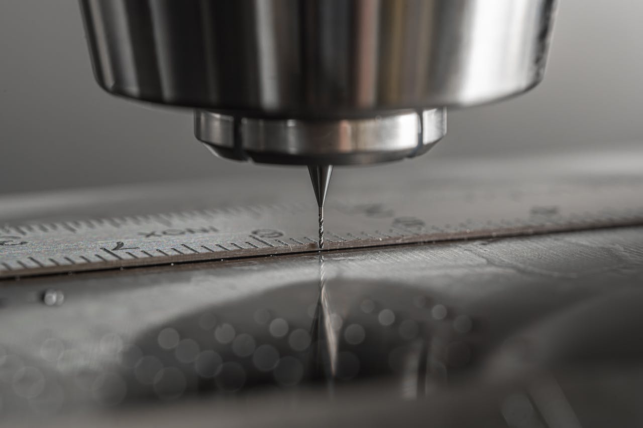 why-choose-us Detailed close-up of a CNC milling machine working on metal, showcasing precision and industry technology.